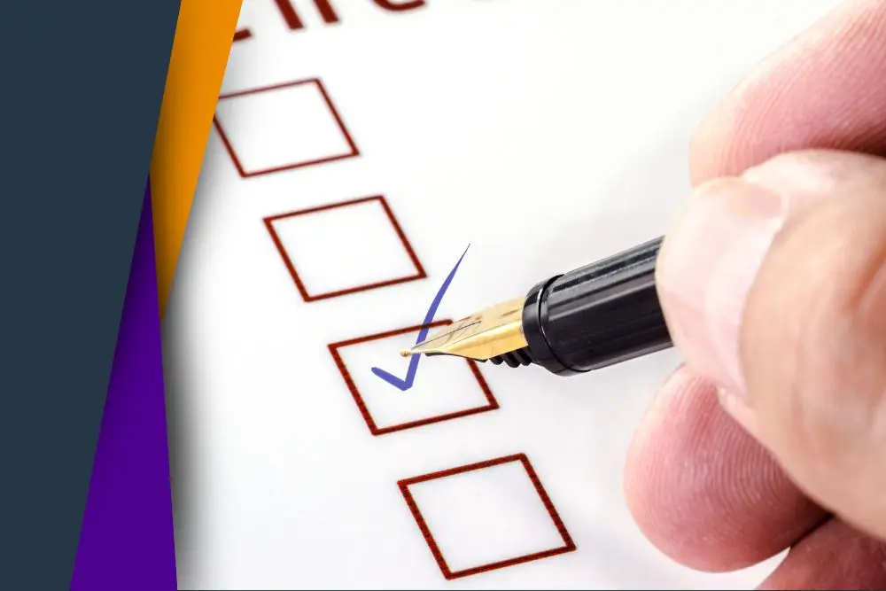Hand checking a box on paper
